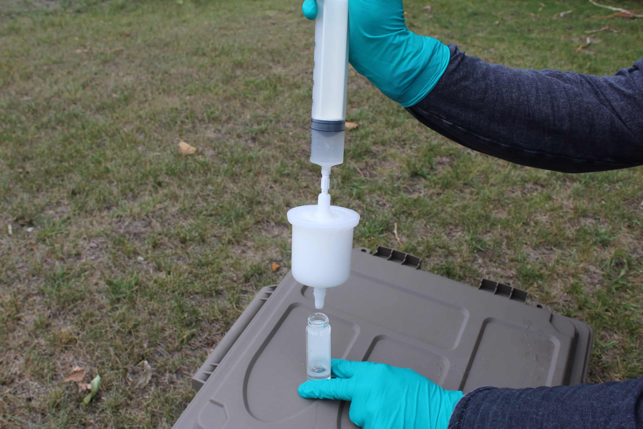 eDNA Filter extracting sample using a syringe with adaptor